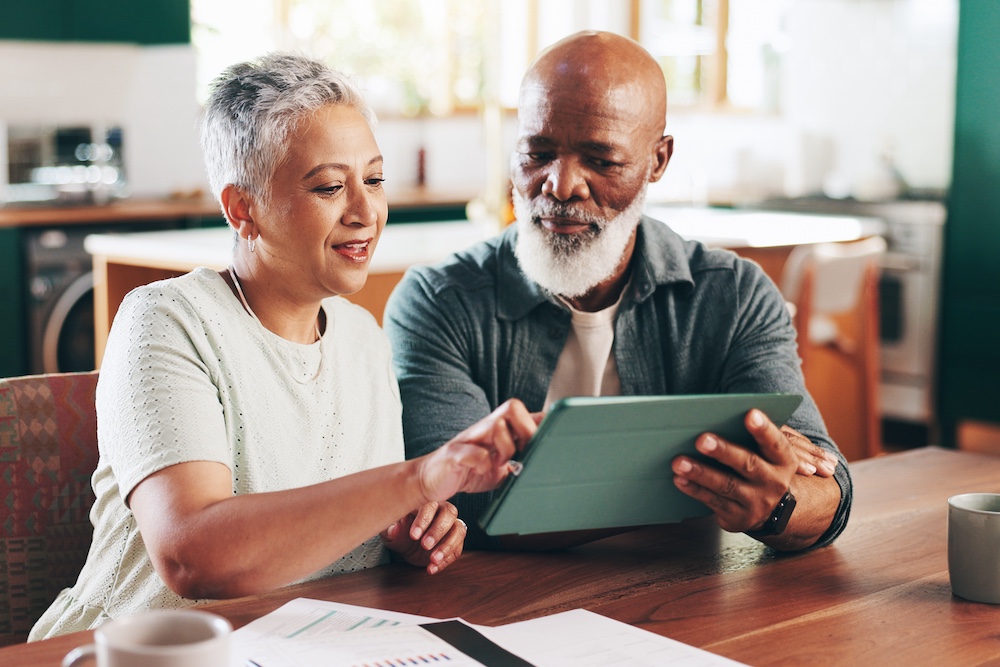 Couple reviewing investment performance.